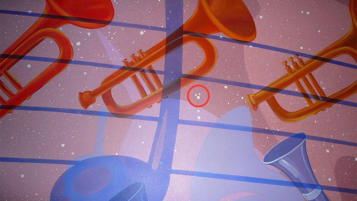 close up of hidden Mickey on wall inside of Philharmonic at Walt Disney World in Orlando, Florida, USA